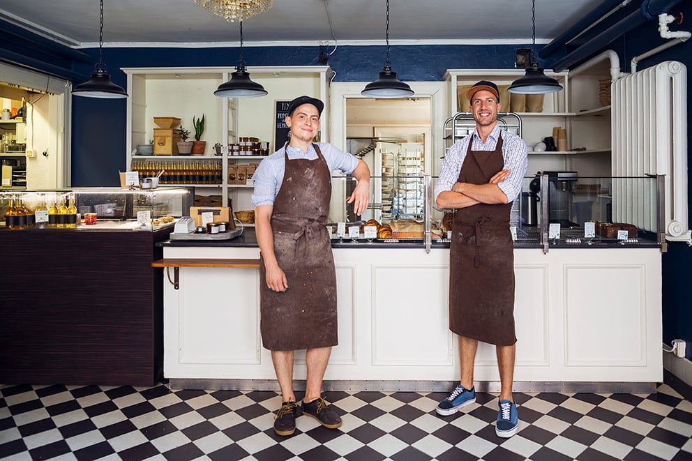 portrait-of-young-owners-in-bakery